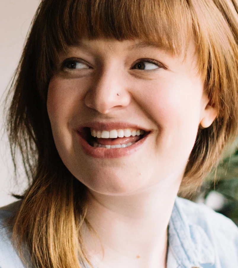 Everyday portrait: skin evened, smile and texture kept (default settings) — after
