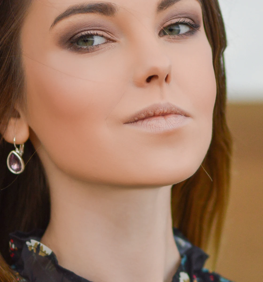 Portrait Lift: firmer jawline and lifted mouth corners (default settings) — after